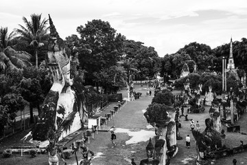 Famous Buddha park in Vientiane, Laos with numerous Buddha statues. Black and white