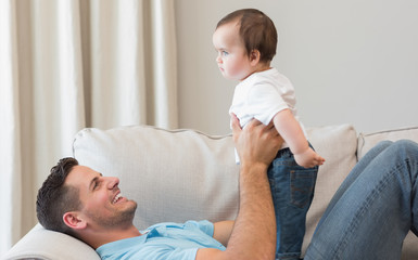 Father playing with baby 