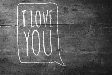 Fototapeta premium i love you against overhead of wooden planks