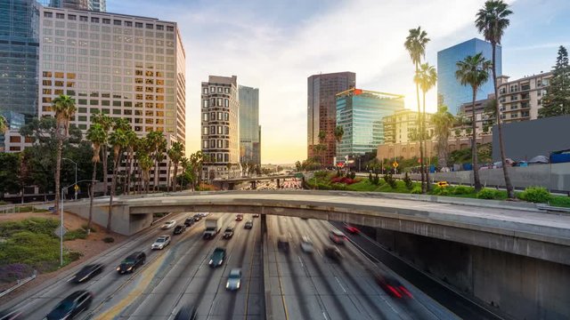 Time lapse of Los Angeles city freeway traffic at sunset
