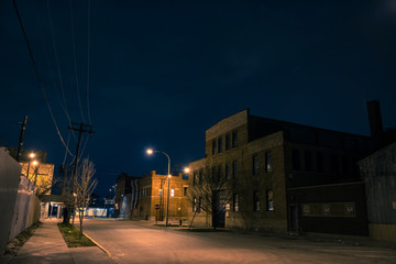 Industrial urban street city night scenery in Chicago with a vintage warehouses