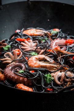 Tasty seafood spaghetti made of octopus, tiger prawns