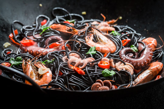 Closeup of spaghetti with seafood with shrimp and octopus