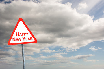Happy new year against sky 