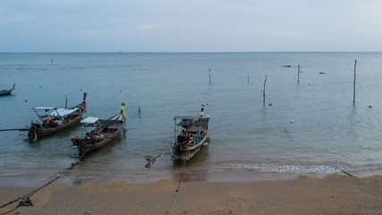 Fototapeta na wymiar Fishing boat parked on the sea shore