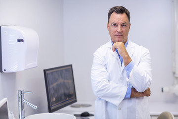 Portrait of confident dentist