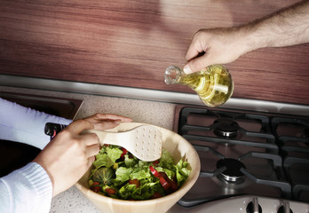 couple preparing salad