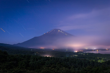 Nightscape of Mountain Fuji with cloud at Yamanaka lake