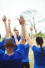 Fit people performing stretching exercise