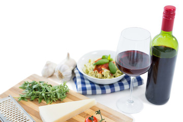 Close up of food and wine bottle