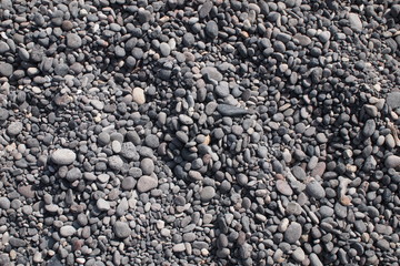 Pebbles make up black Sand beach
