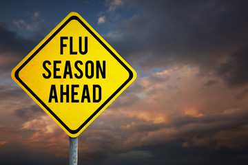 flu season ahead against blue and orange sky with clouds