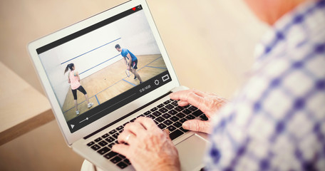 View of lecture app against senior man using laptop