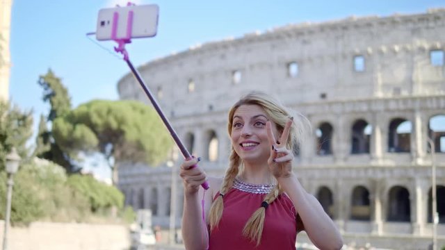 Blonde Tourist Woman Taking Selfie s At Colosseum With Smartphone- Rome