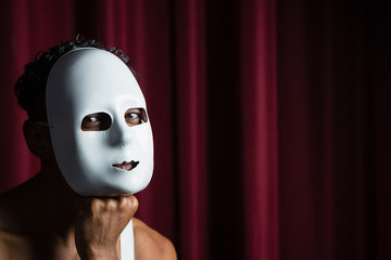 Artist wearing white mask on his face