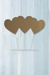 love hearts against bleached wooden planks background