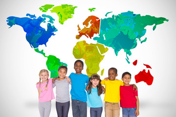 Elementary pupils smiling against white background with world map