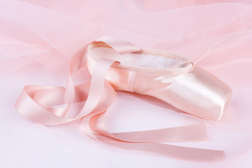 Fototapeta na wymiar Ballet shoe with pink ballet costume