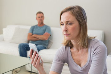 Unhappy couple not talking after an argument at home