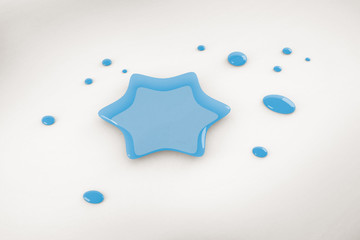 A blue star paint splash on white background