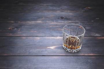 Fototapeta na wymiar Alcohol addiction. Alcoholism. Whiskey in a glass.