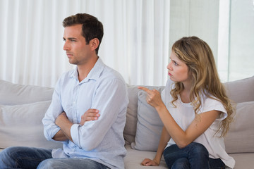 Couple having an argument in living room