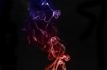 abstract colorful fragment movement of white smoke on black background.