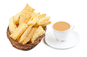 Indian Tea Time Breakfast Khari Also Know as Kharee, Khari Biscuit or Salty Puff Pastry Snacks, Served with Indian Hot Masala Chai or Hot Tea Isolated on White Background