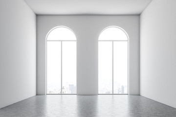 White empty room interior with two arched windows