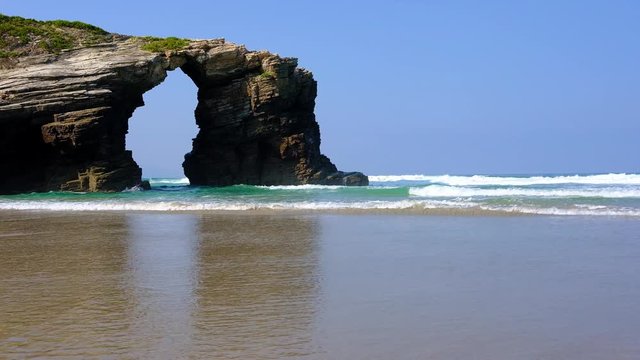 Beach of the Cathedrals. Natural arch at Las Catedrales beach known as Praia de Augas Santas (Beach of the Holy Waters) in Galicia, Spain