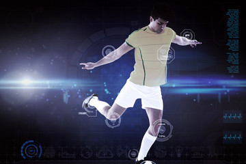 Fototapeta na wymiar Football player against blue dots on black background