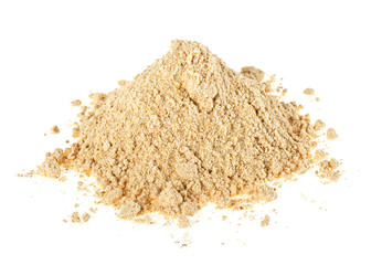 Heap of dried ginger powder isolated on white background