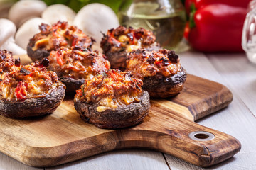 Baked champignon caps stuffed with minced meat