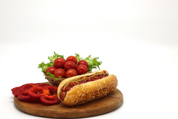 Hot dogs and French fries on white background.