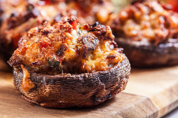 Baked champignon caps stuffed with minced meat