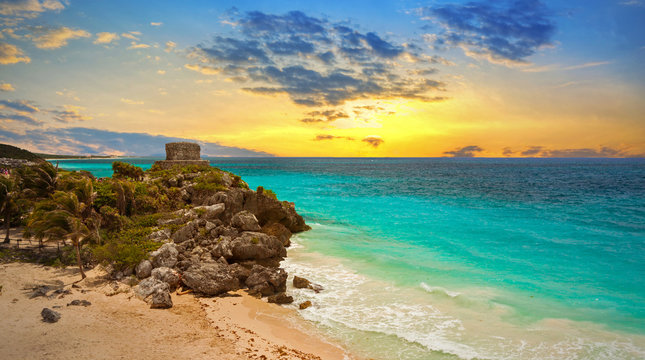 Caribbean beach at the cliff in Tulum at sunset, Mexico
