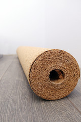 natural cork substrate on the floor with laminate