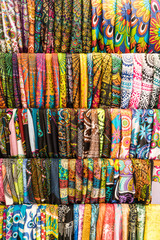 Colorful textile and kerchiefs for sale
