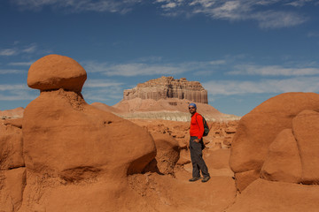 Fototapeta na wymiar Hiker visit Goblin valley state park in Utah, USA
