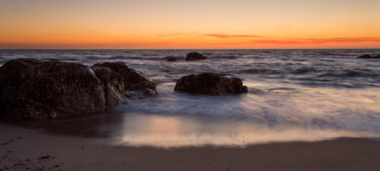 Fototapeta na wymiar Incoming Tide at Sunset