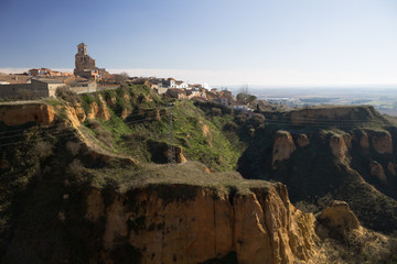 Fototapeta na wymiar Village on top of a Canyon