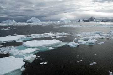 Southern Ocean Antarctica, coastal landscape with ice floe on stormy day