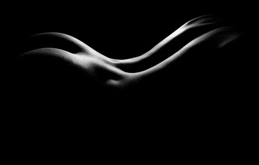 Artistic image of a nude woman`s back 