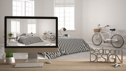 Architect designer project concept, wooden table with keys, 3D letters making the words bedroom design and desktop showing draft, blurred space in the background, interior design