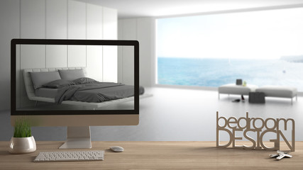 Fototapeta na wymiar Architect designer project concept, wooden table with keys, 3D letters making the words bedroom design and desktop showing draft, blurred space in the background, interior design