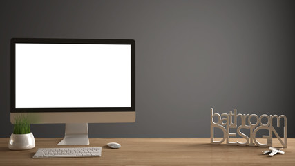 Desktop mockup, template, computer on wooden work desk with blank screen, house keys, 3D letters making the words bathroom design, dark copy space background