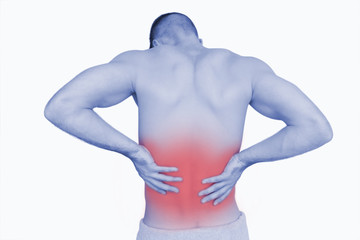 Rear view of shirtless man with back pain over white background