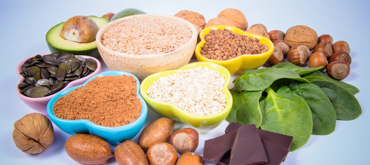 Products containing magnesium. Healthy food. White background.