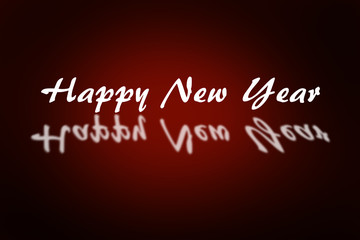 Happy New Year against red background with vignette