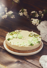 Tasty cheesecake decorated with merenga